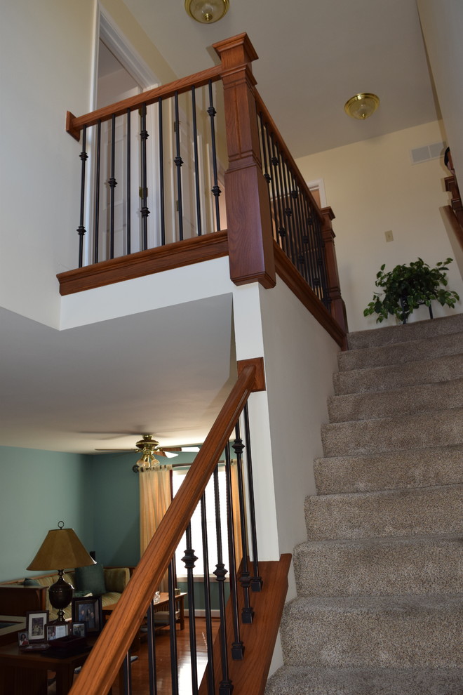 This is an example of a mid-sized contemporary staircase in St Louis.