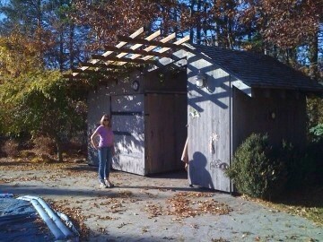 Small gray one-story wood gable roof photo in Boston