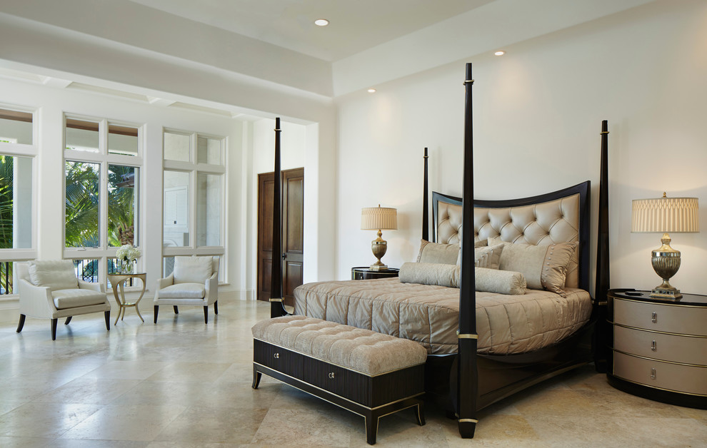 Design ideas for a transitional master bedroom in Miami with beige walls.
