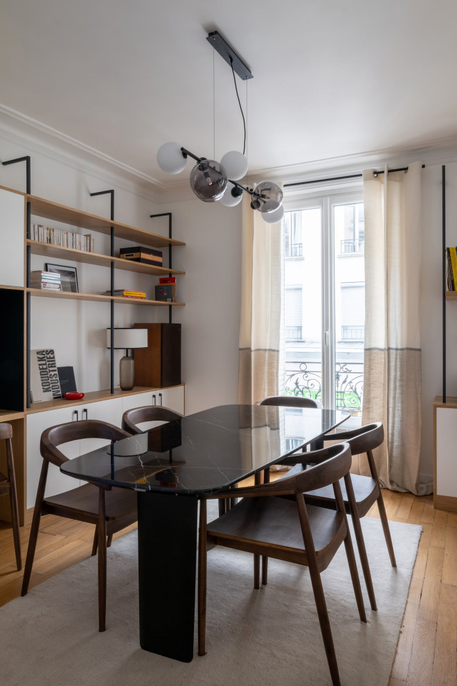 Design ideas for a mid-sized traditional open plan dining in Paris.