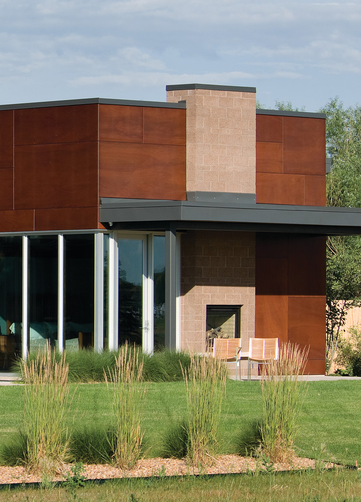 This is an example of a contemporary brown exterior in Denver.