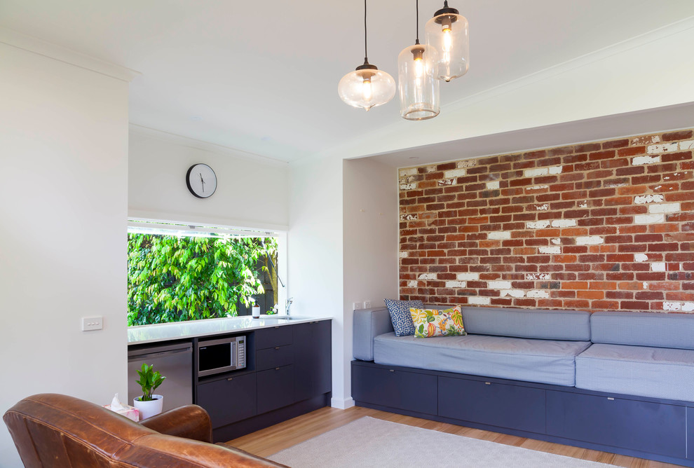 Photo of a small transitional home design in Melbourne.