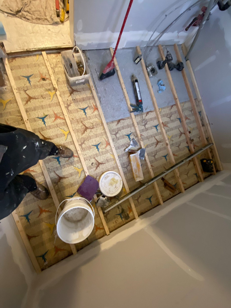 Interior Heating/Drywall/Flooring - Okotoks