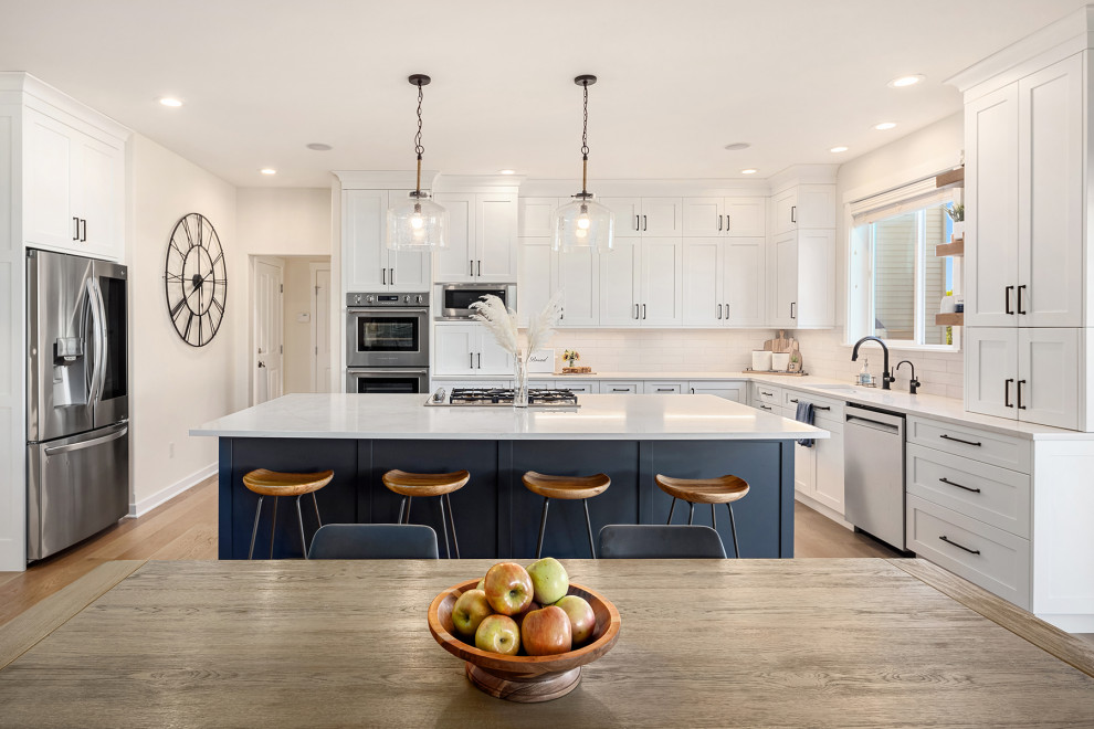 Example of a transitional kitchen design in Seattle