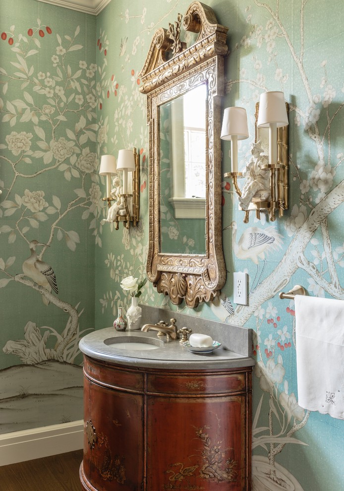 Inspiration for a traditional powder room in Boston with furniture-like cabinets, medium wood cabinets, green walls, dark hardwood floors, an undermount sink, brown floor and grey benchtops.