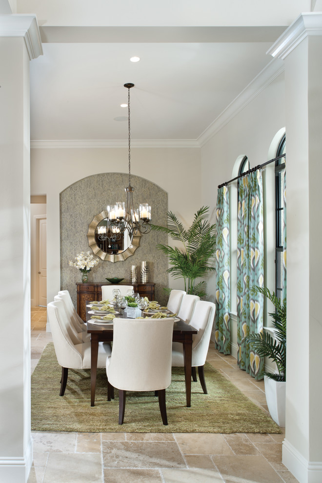 Inspiration for a mediterranean dining room in Tampa with beige walls.