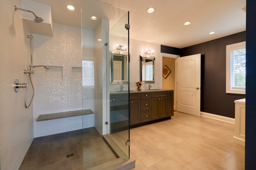 Inspiration for a mid-sized transitional master white tile and mosaic tile ceramic tile and beige floor corner shower remodel in Chicago with recessed-panel cabinets, gray cabinets, blue walls, an undermount sink, quartz countertops, a hinged shower door and gray countertops
