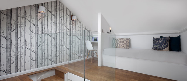 Design ideas for a small contemporary study room in London with white walls, medium hardwood floors and brown floor.