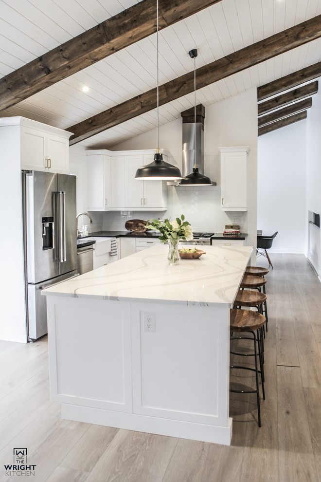 Example of a transitional kitchen design in Toronto