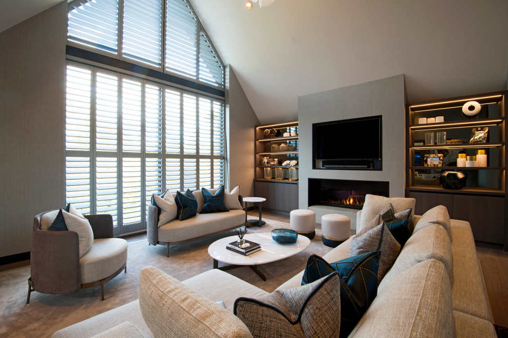 This is an example of a contemporary enclosed living room with grey walls, carpet, a ribbon fireplace, a wall-mounted tv, brown floor and vaulted.