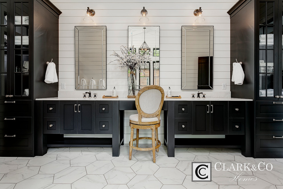 This is an example of an expansive country master bathroom in Boise with shaker cabinets, black cabinets, a freestanding tub, an alcove shower, white tile, stone tile, white walls, marble floors, an undermount sink and engineered quartz benchtops.