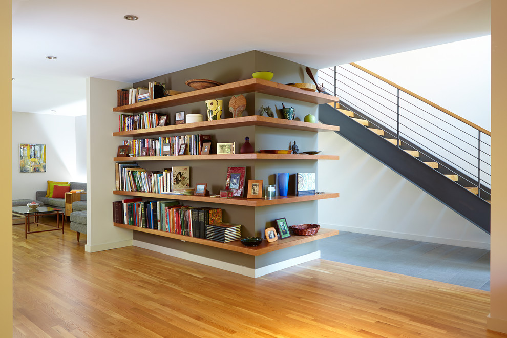 Photo of a contemporary wood straight staircase in San Francisco with open risers and cable railing.