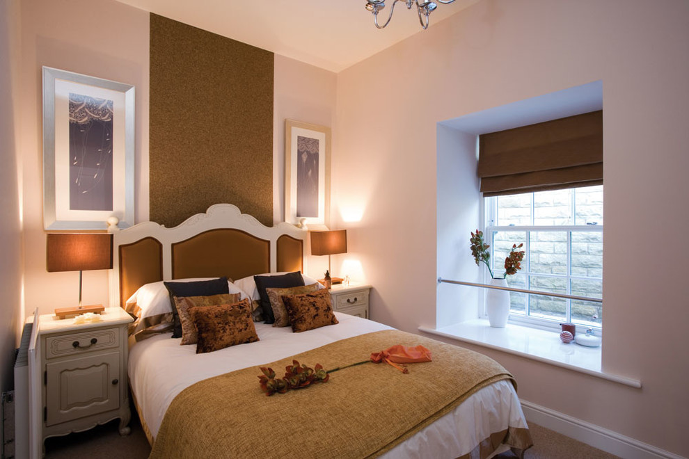 This is an example of a traditional bedroom in Manchester with multi-coloured walls.