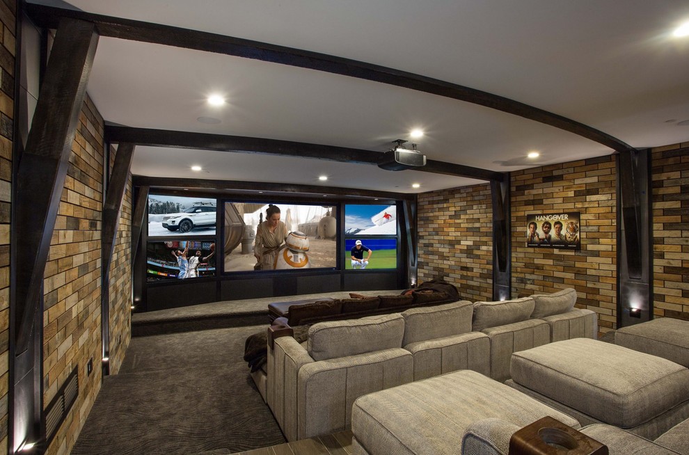 Design ideas for a large transitional enclosed home theatre in Salt Lake City with multi-coloured walls, carpet, a projector screen and grey floor.