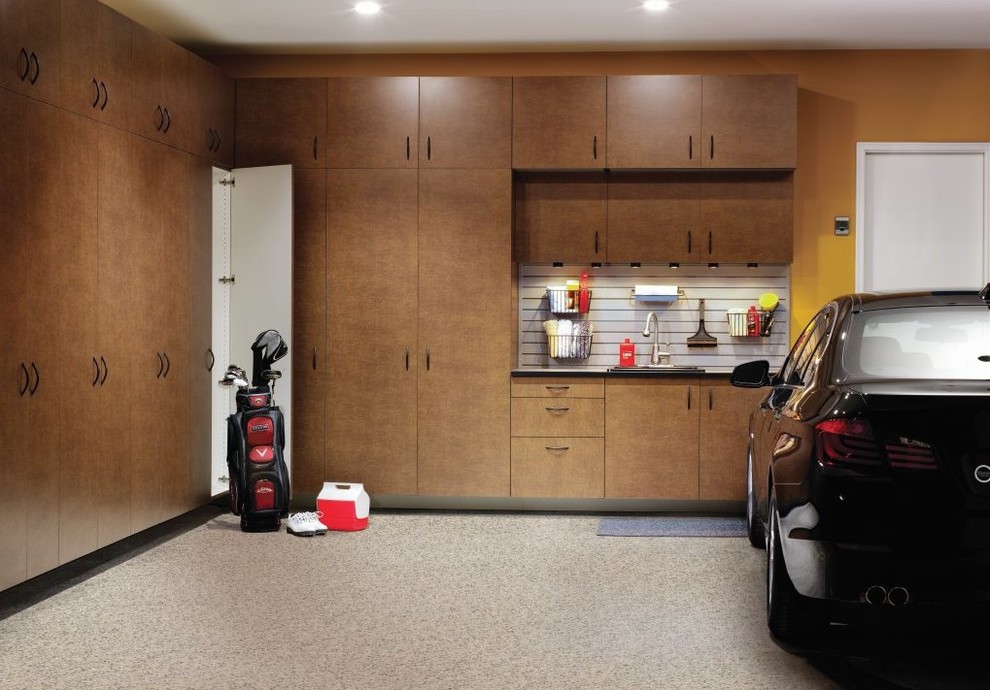 Design ideas for a large transitional attached garage in Other.
