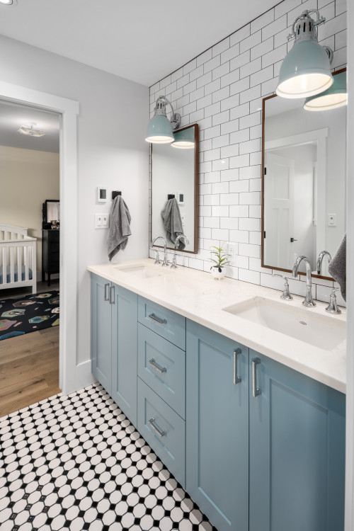 White Backsplash in Sync with Blue Cabinet in Farmhouse Bathroom