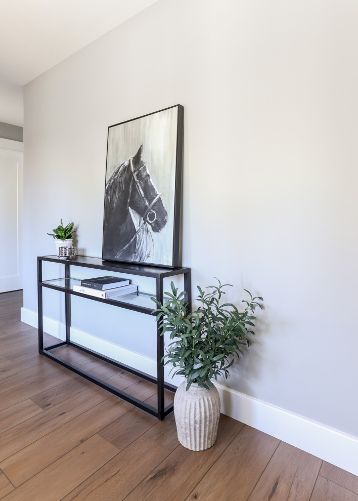 Example of a transitional home design design in Toronto