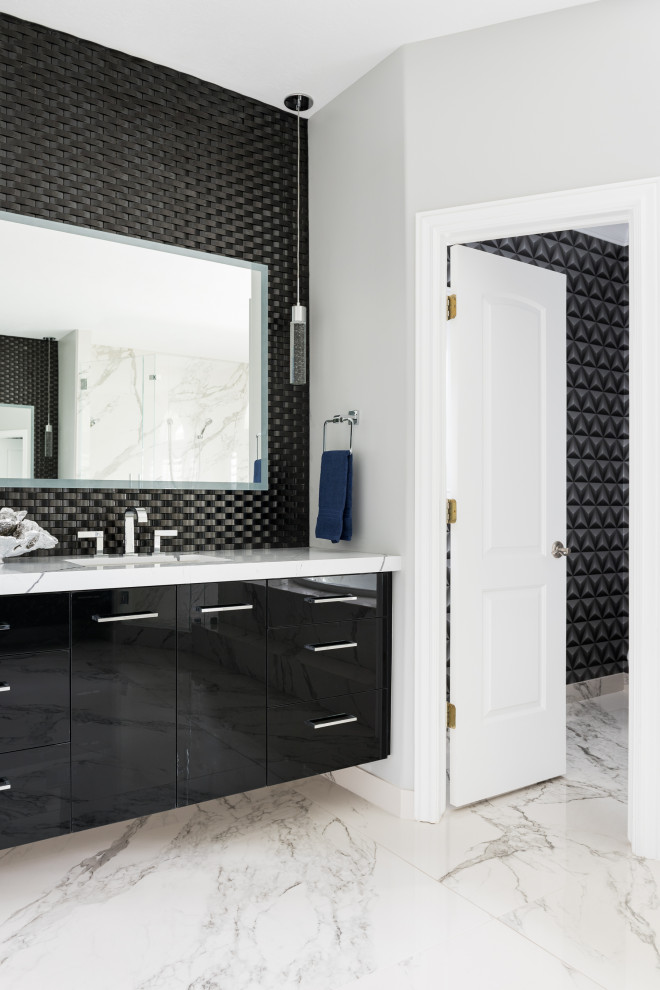 Photo of a large contemporary master bathroom in Salt Lake City with flat-panel cabinets, black cabinets, a single vanity, a floating vanity, black tile, grey walls, an undermount sink, grey floor and white benchtops.