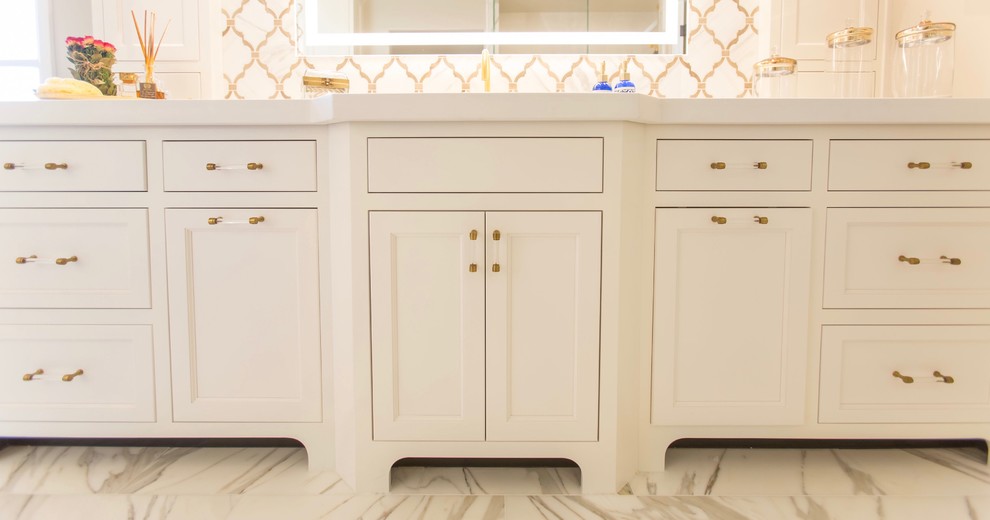 Inspiration for a transitional master white tile and stone tile marble floor home design remodel in Phoenix with recessed-panel cabinets, white cabinets, gray walls, an undermount sink and quartz countertops