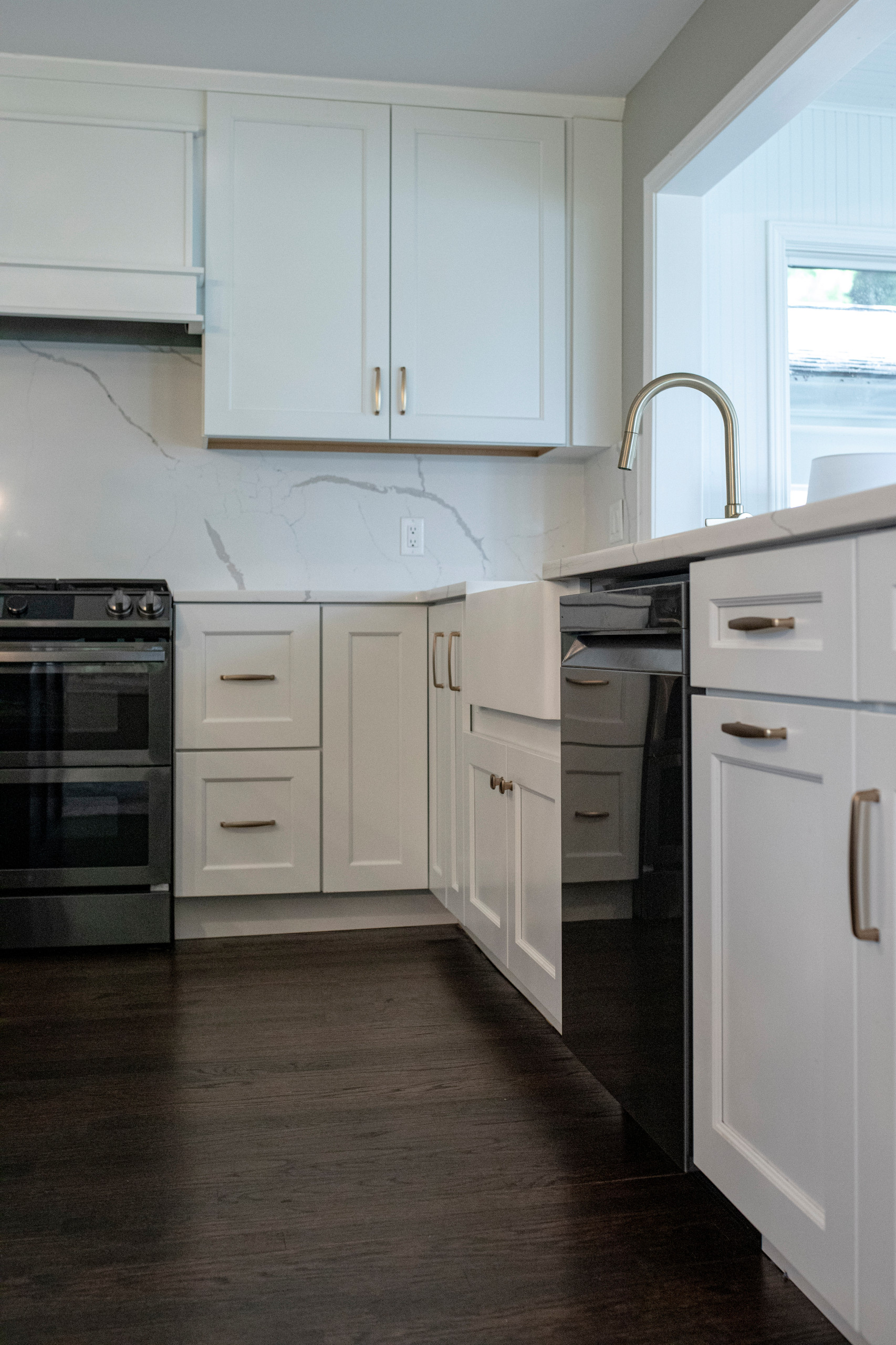 Full Interior Renovation. Kitchen renovation which combined dining and sunroom with new kitchen.