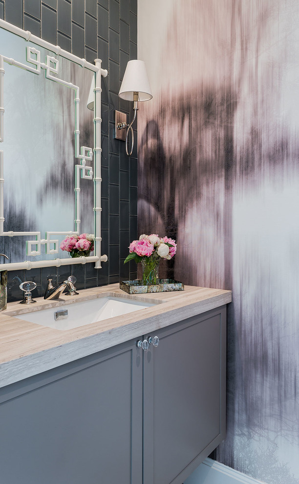 Design ideas for a transitional powder room in Manchester with an undermount sink, shaker cabinets, grey cabinets, gray tile and multi-coloured walls.