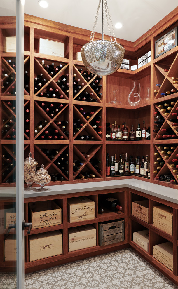 Photo of a country wine cellar in San Francisco with ceramic floors, diamond bins and grey floor.