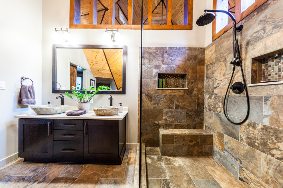 Inspiration for a mid-sized rustic master multicolored tile and porcelain tile porcelain tile and multicolored floor freestanding bathtub remodel with a vessel sink, shaker cabinets, quartz countertops, a one-piece toilet, gray walls and dark wood cabinets