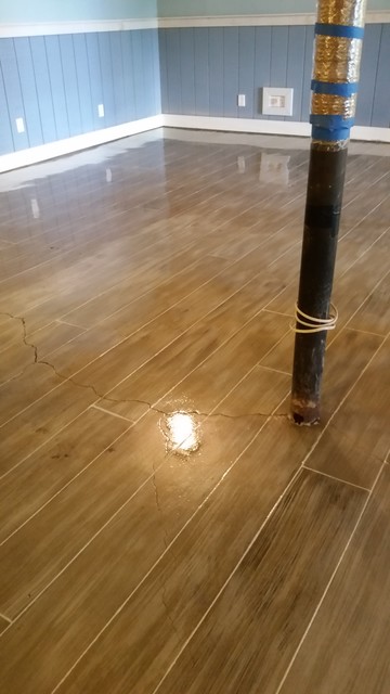 Concrete Floor Stained And Cut With A Hardwood Floor Pattern