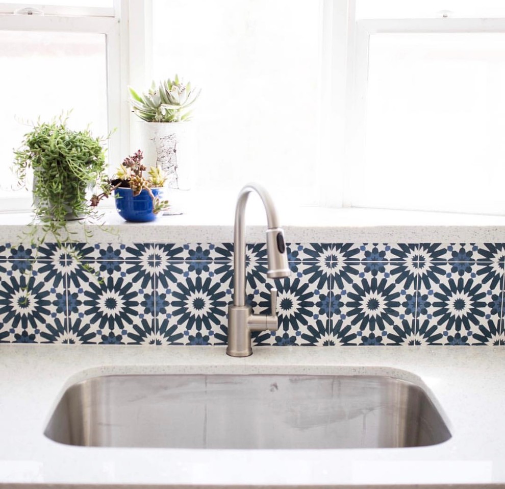 Example of a mid-sized trendy kitchen design in Phoenix with cement tile backsplash, an undermount sink and multicolored backsplash
