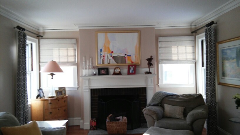 This is an example of a mid-sized transitional living room in Boston with beige walls and medium hardwood floors.