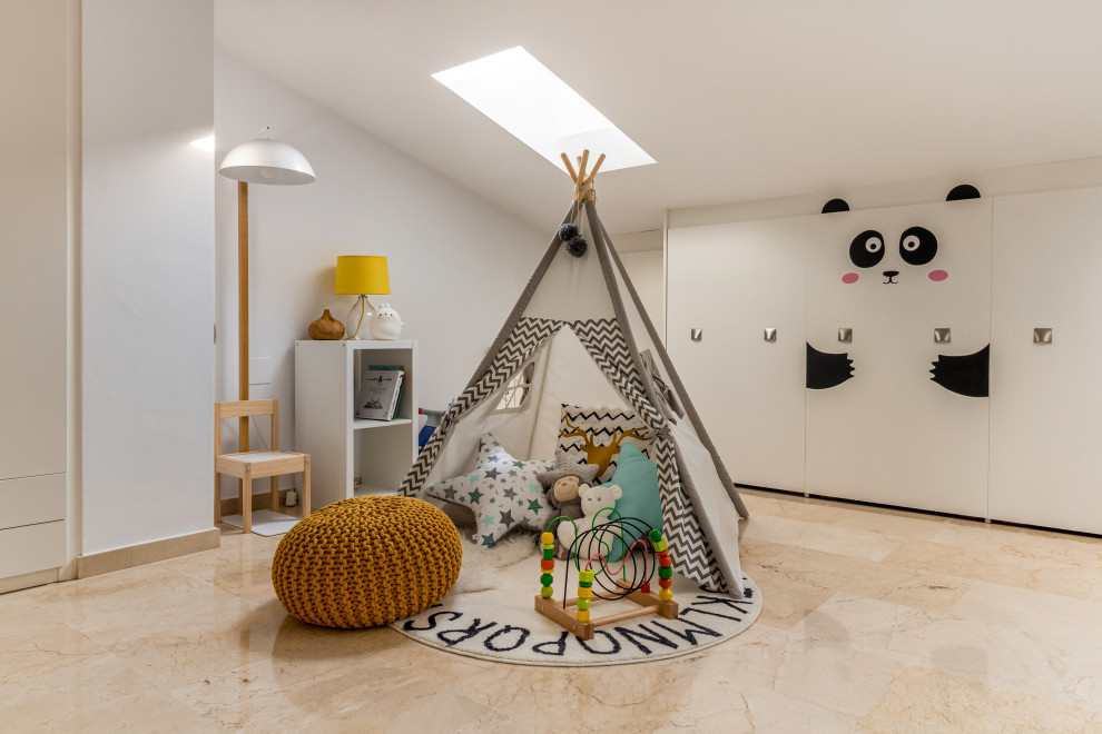 На фото: нейтральная детская среднего размера в современном стиле с спальным местом, белыми стенами, мраморным полом и бежевым полом для ребенка от 1 до 3 лет с
