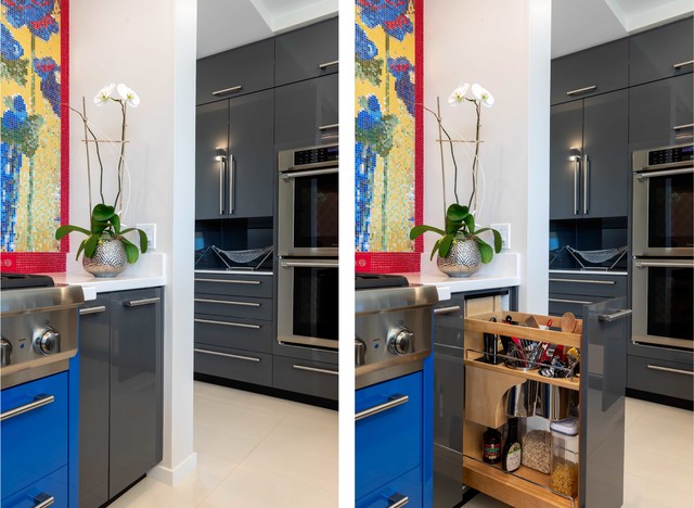 Example of a large minimalist u-shaped white floor eat-in kitchen design in Hawaii with flat-panel cabinets, gray cabinets, solid surface countertops, multicolored backsplash, mosaic tile backsplash, paneled appliances, an island and white countertops