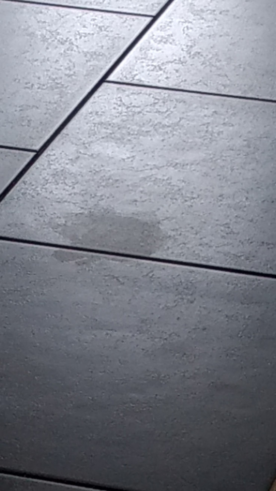 Dull spots on porcelain tile finish