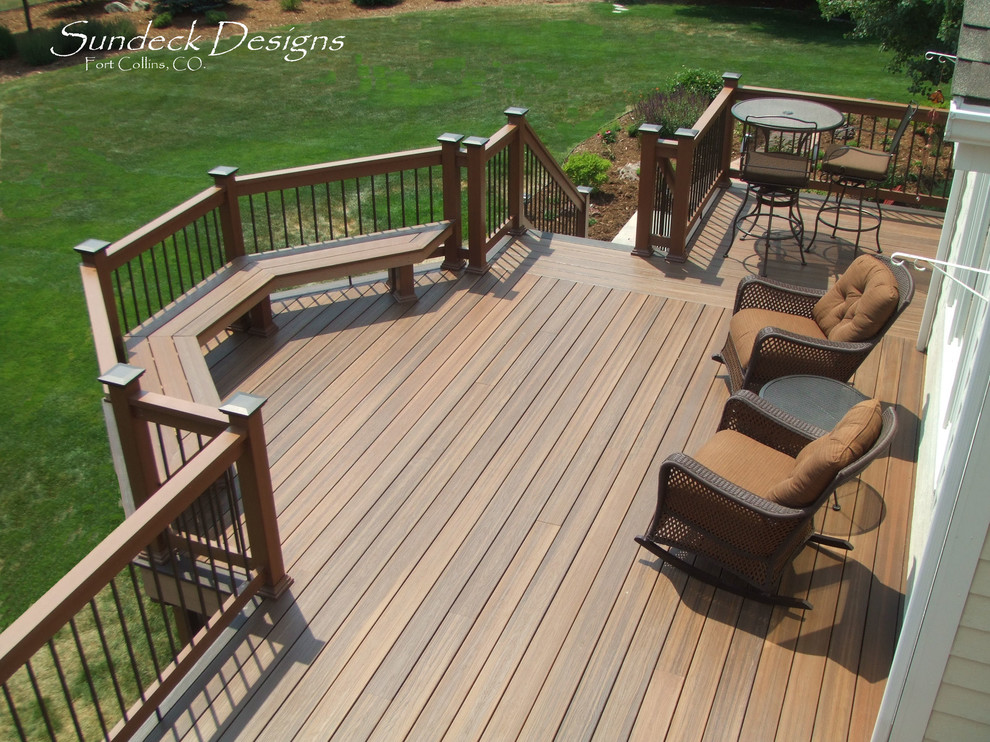 Inspiration for a mid-sized transitional backyard deck remodel in Denver