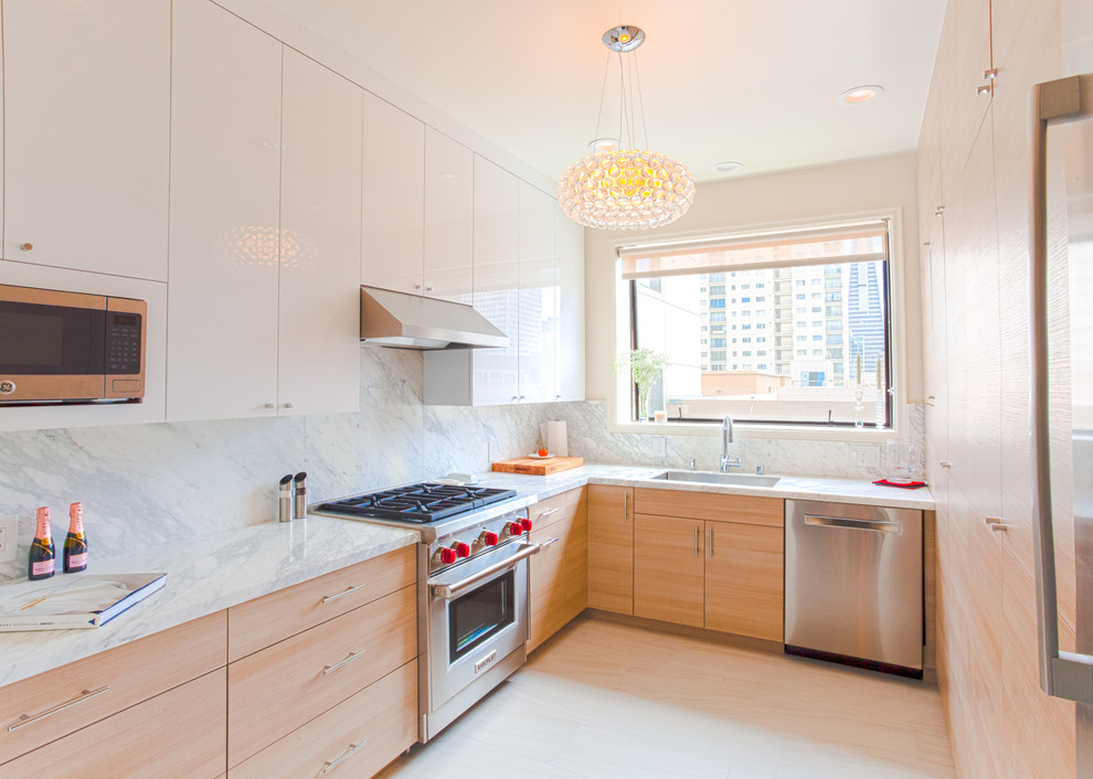 This is an example of a contemporary separate kitchen in San Francisco.