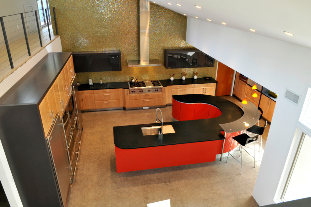 Photo of an expansive modern u-shaped open plan kitchen in New York with an undermount sink, flat-panel cabinets, red cabinets, granite benchtops, stainless steel appliances, porcelain floors and with island.