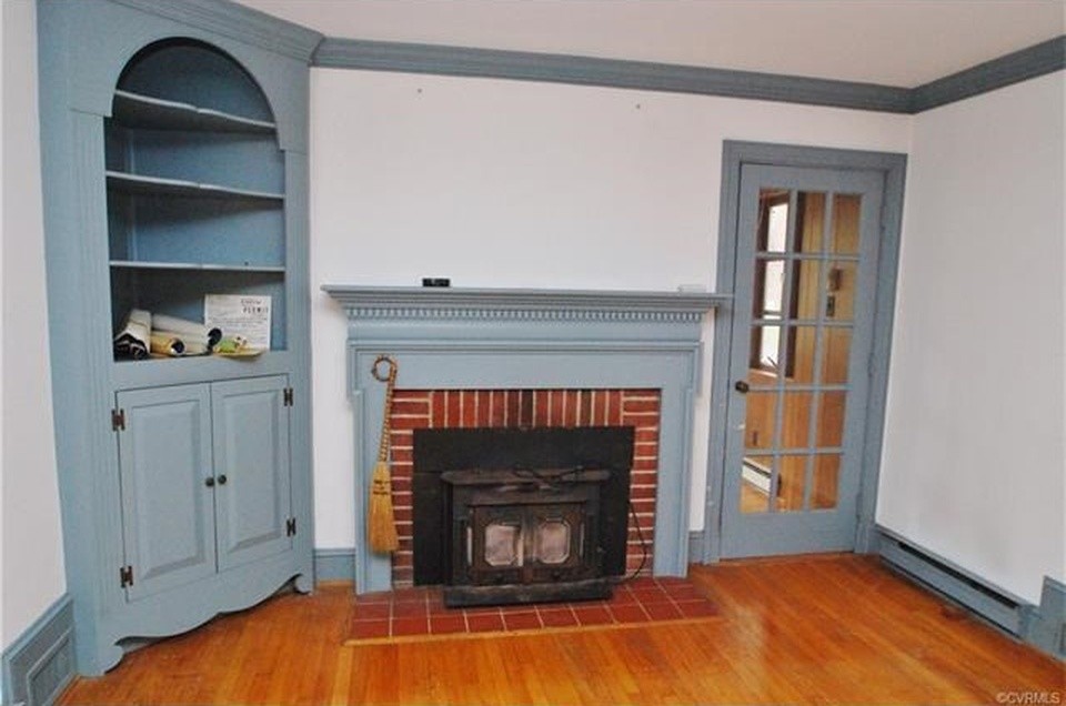 Fireplace remodel- should I get rid of my old wood stove?