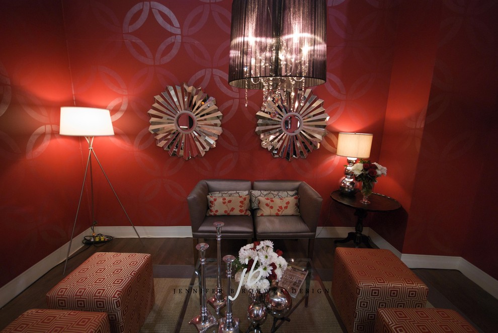 Photo of a mid-sized traditional living room in Toronto with red walls and carpet.