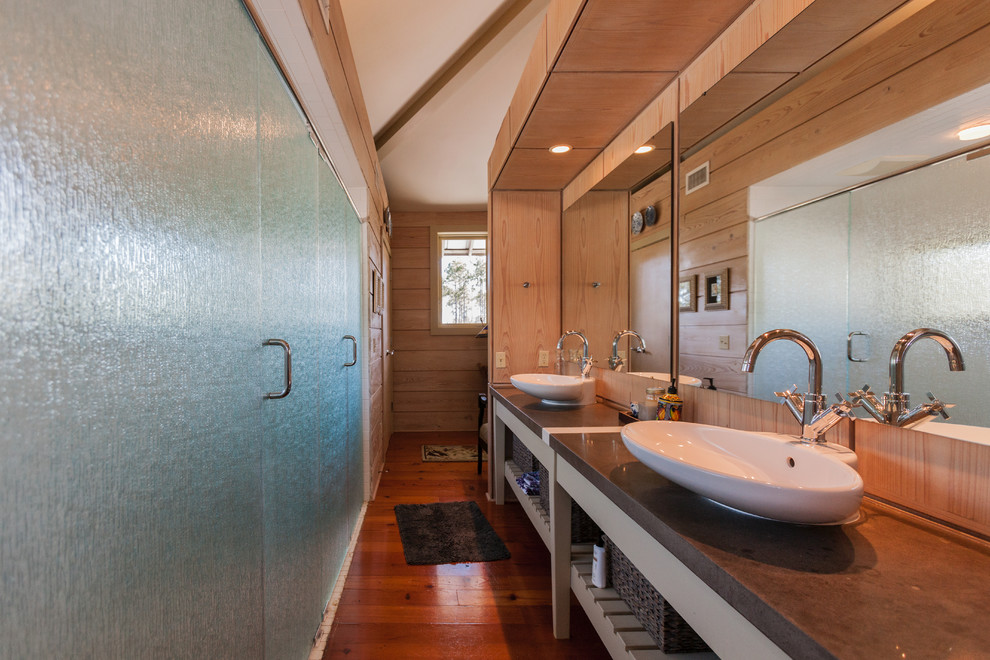 Inspiration for a mid-sized country master bathroom in Other with open cabinets, beige tile, beige walls, medium hardwood floors, a vessel sink, copper benchtops, brown floor and a hinged shower door.