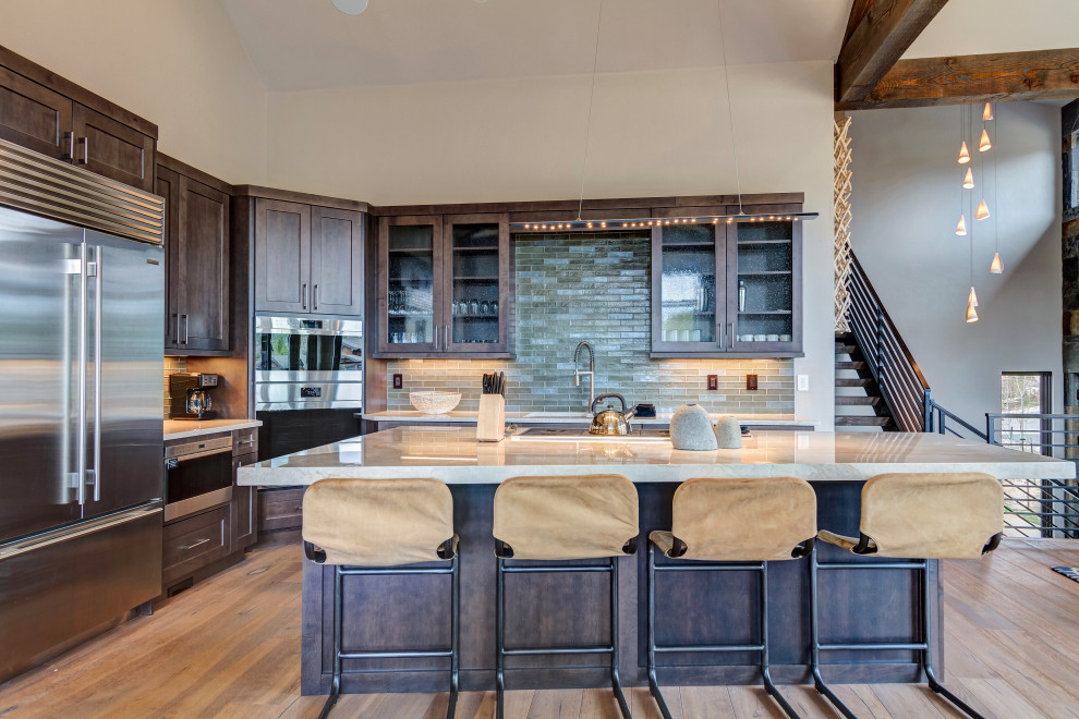 Example of a mountain style kitchen design in Denver