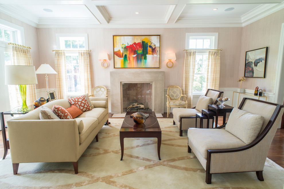 This is an example of a large traditional formal enclosed living room in Boston with beige walls, dark hardwood floors, a standard fireplace, a concrete fireplace surround and no tv.