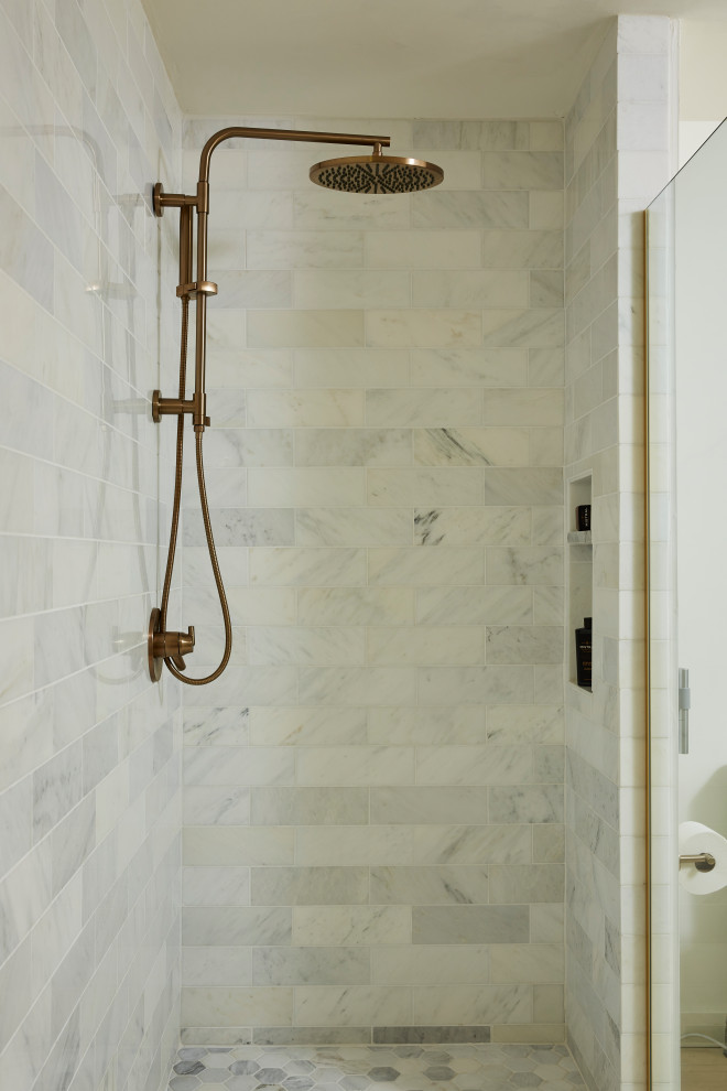 Mid-sized minimalist master white tile and marble tile light wood floor, beige floor and double-sink bathroom photo in Minneapolis with flat-panel cabinets, brown cabinets, a bidet, white walls, an integrated sink, marble countertops, white countertops and a freestanding vanity