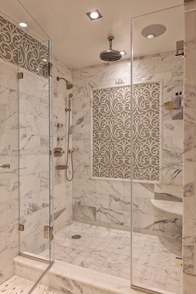 This is an example of a traditional bathroom in New York with an alcove shower, white tile and a shower seat.