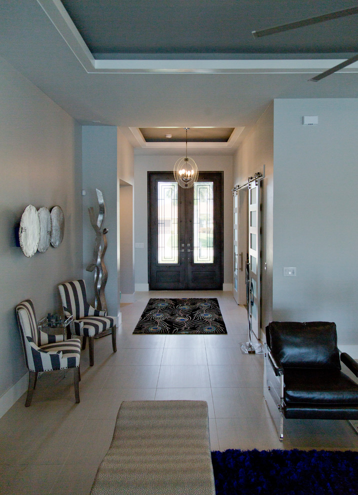 Mid-sized contemporary front door in Miami with grey walls, ceramic floors, a double front door, a gray front door and beige floor.