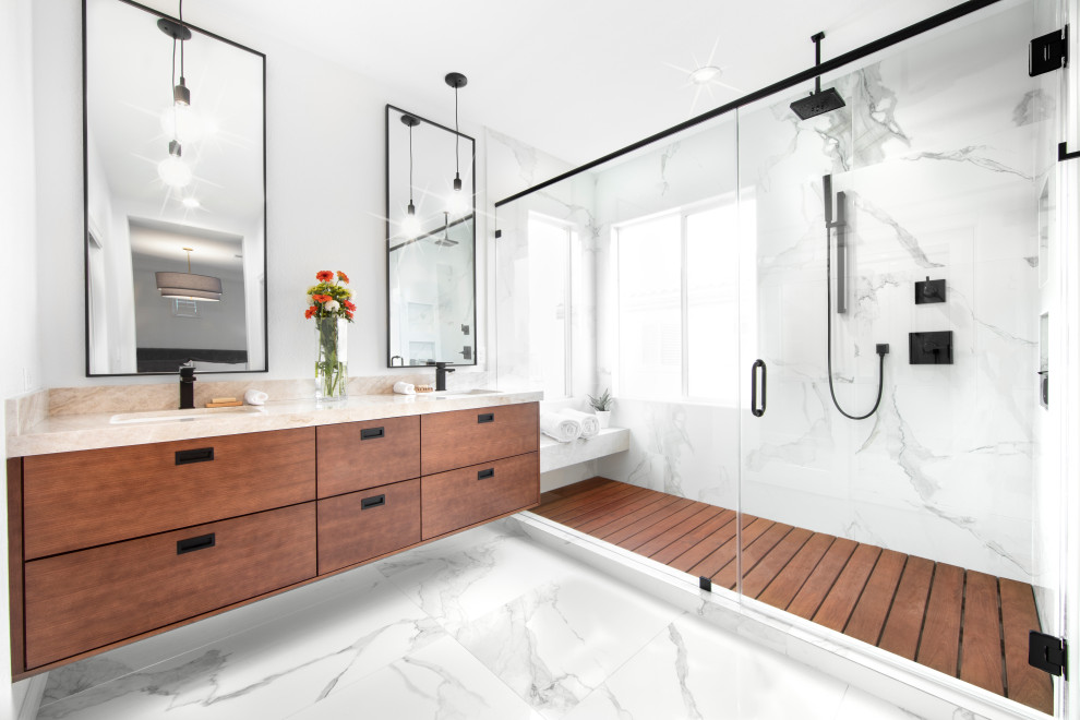 Mid-sized contemporary master wet room bathroom in Las Vegas with flat-panel cabinets, medium wood cabinets, a one-piece toilet, white walls, porcelain floors, an undermount sink, quartzite benchtops, a hinged shower door, a shower seat, a double vanity and a floating vanity.