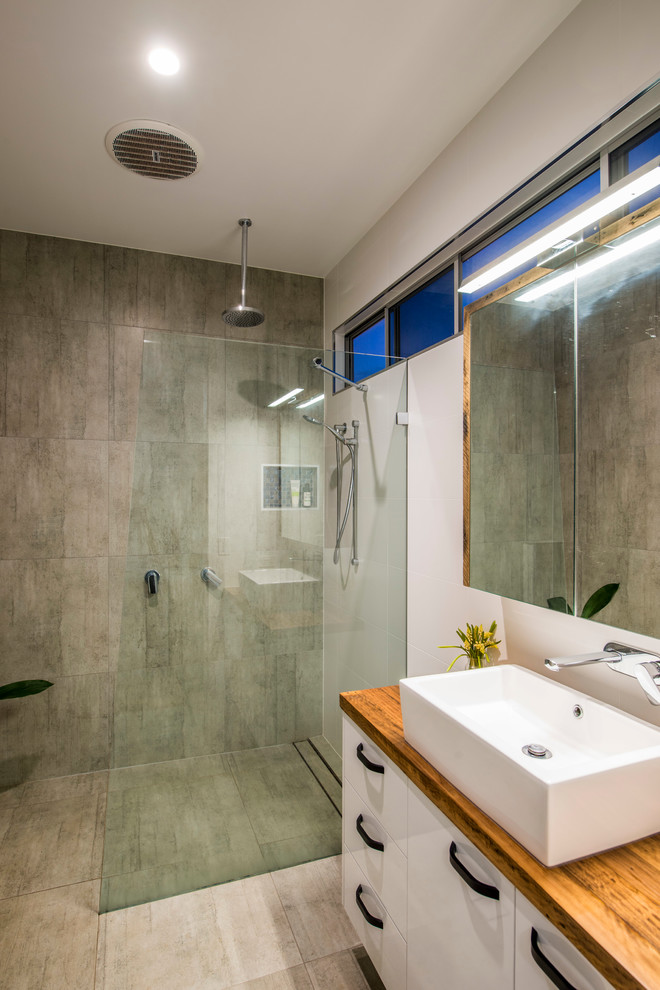 Design ideas for a contemporary bathroom in Gold Coast - Tweed with a vessel sink, white cabinets, wood benchtops, an open shower, an open shower and brown benchtops.