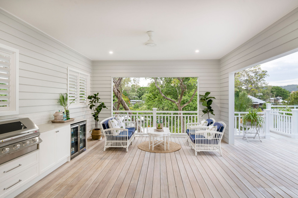 This is an example of a beach style deck in Brisbane.