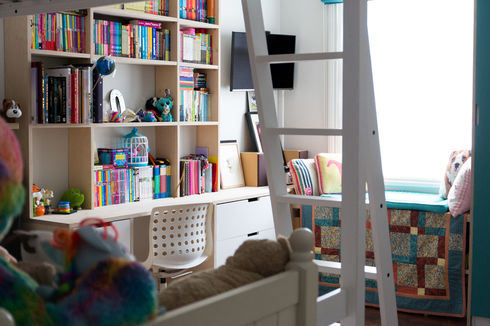 Photo of a small eclectic kids' bedroom for kids 4-10 years old and girls in Other with white walls.