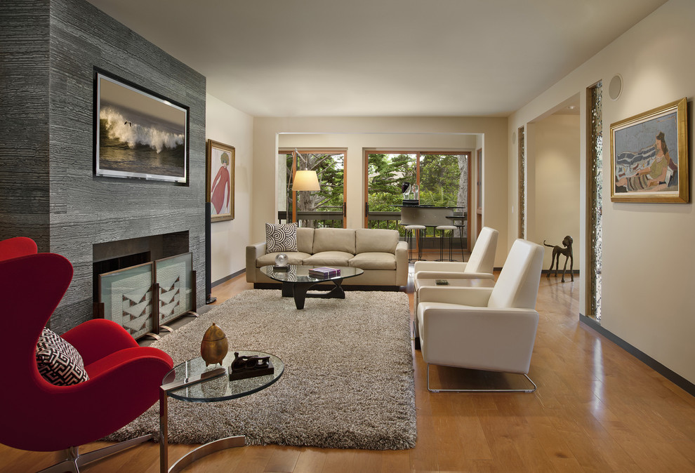 Contemporary enclosed living room in Santa Barbara with beige walls.