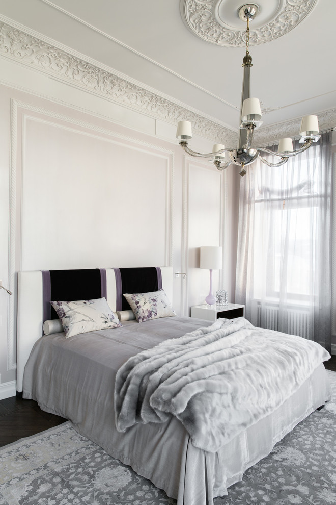 Traditional master bedroom in Moscow with white walls and carpet.